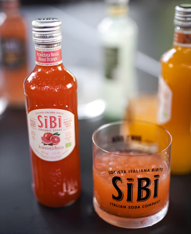 Sibì Organic Soda sparkling botanical beverage by Sibilla Waters in glass bottle with natural ingredients